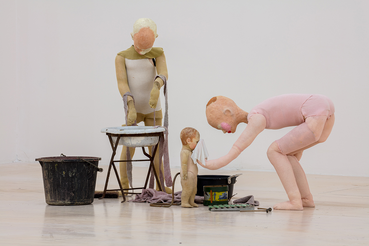 Sculpture of a family in a domestic setting by artist Cathy Wilkes