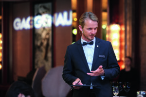 Sommelier talks guests through wine choices
