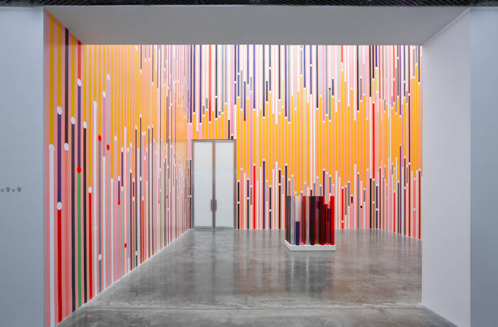 Gallery installation shot showing work by Sarah Morris