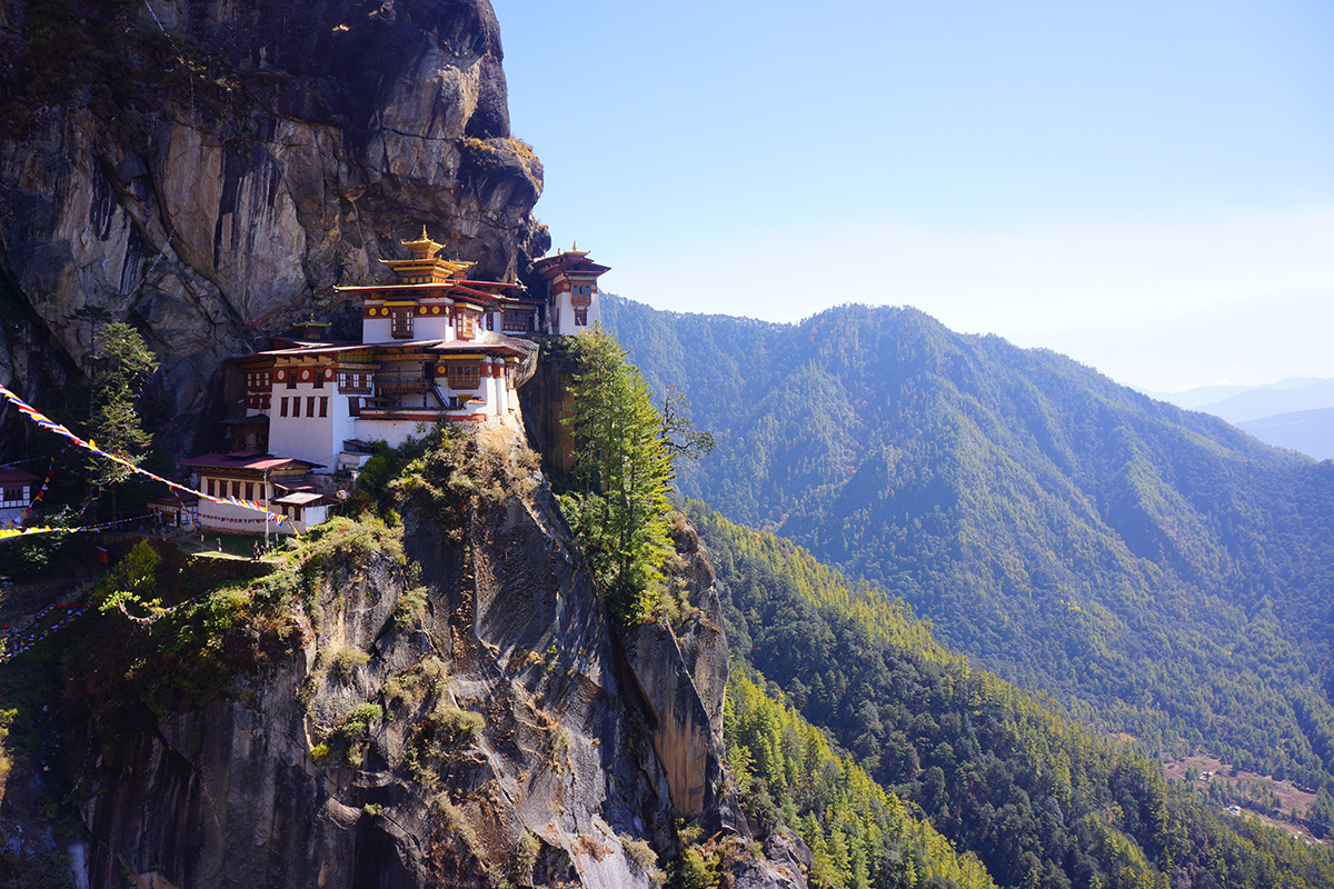 A cliffside settlement of traditional buildings in Bhutan