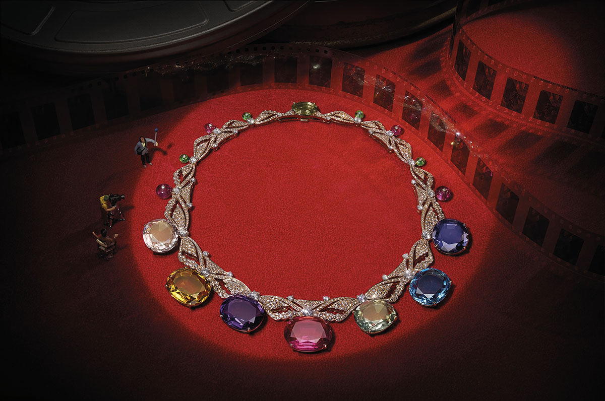 Still life image of a diamond necklace on a red carpet 
