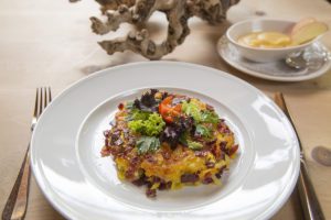 Plate of food with lettuce garnish