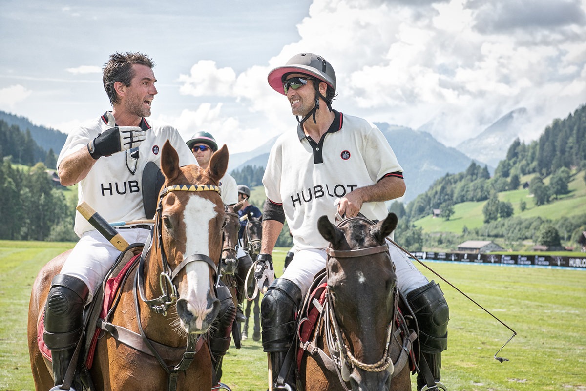 Two polo players in conversation on their ponies