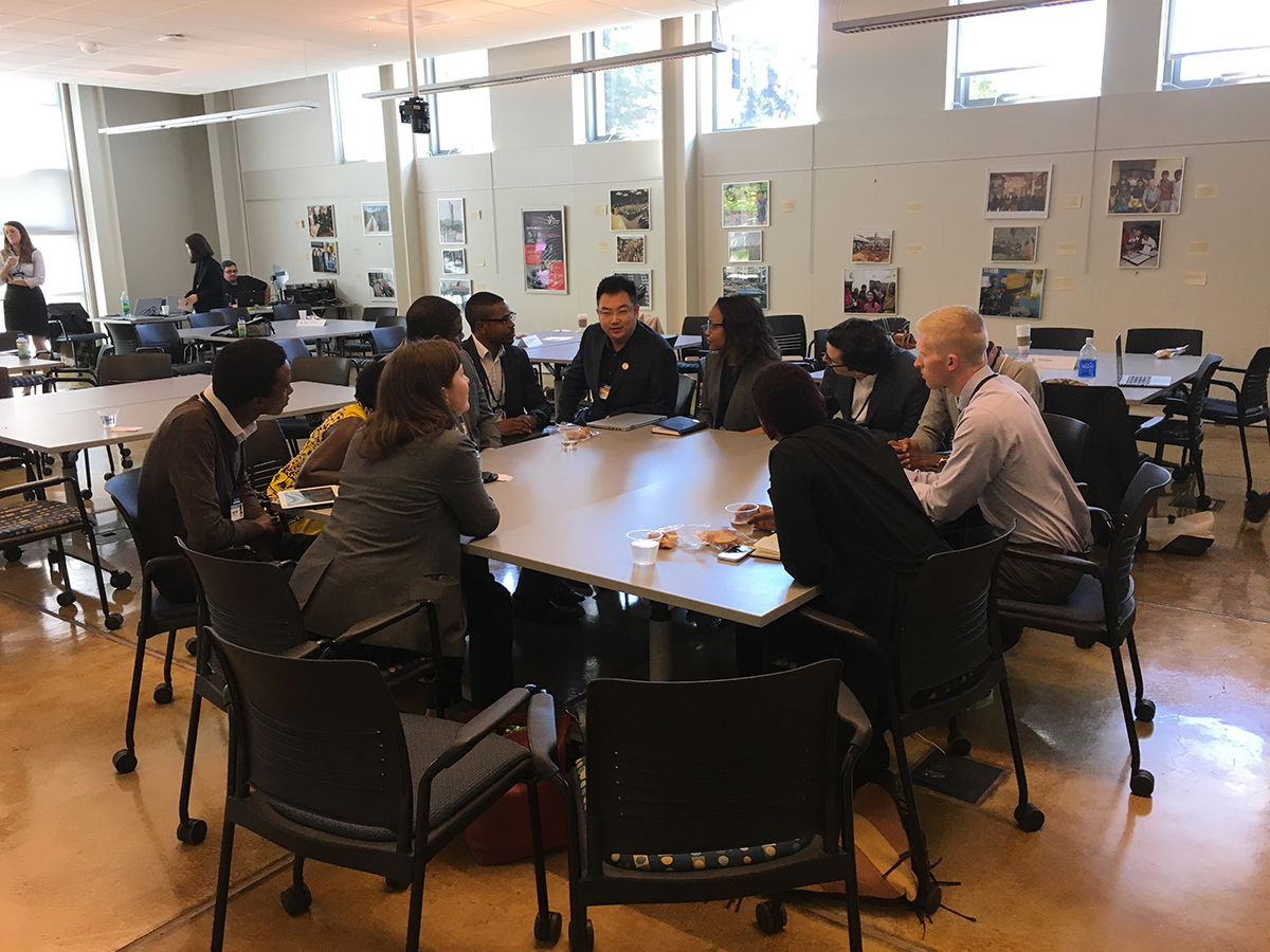 People having a meeting around a table