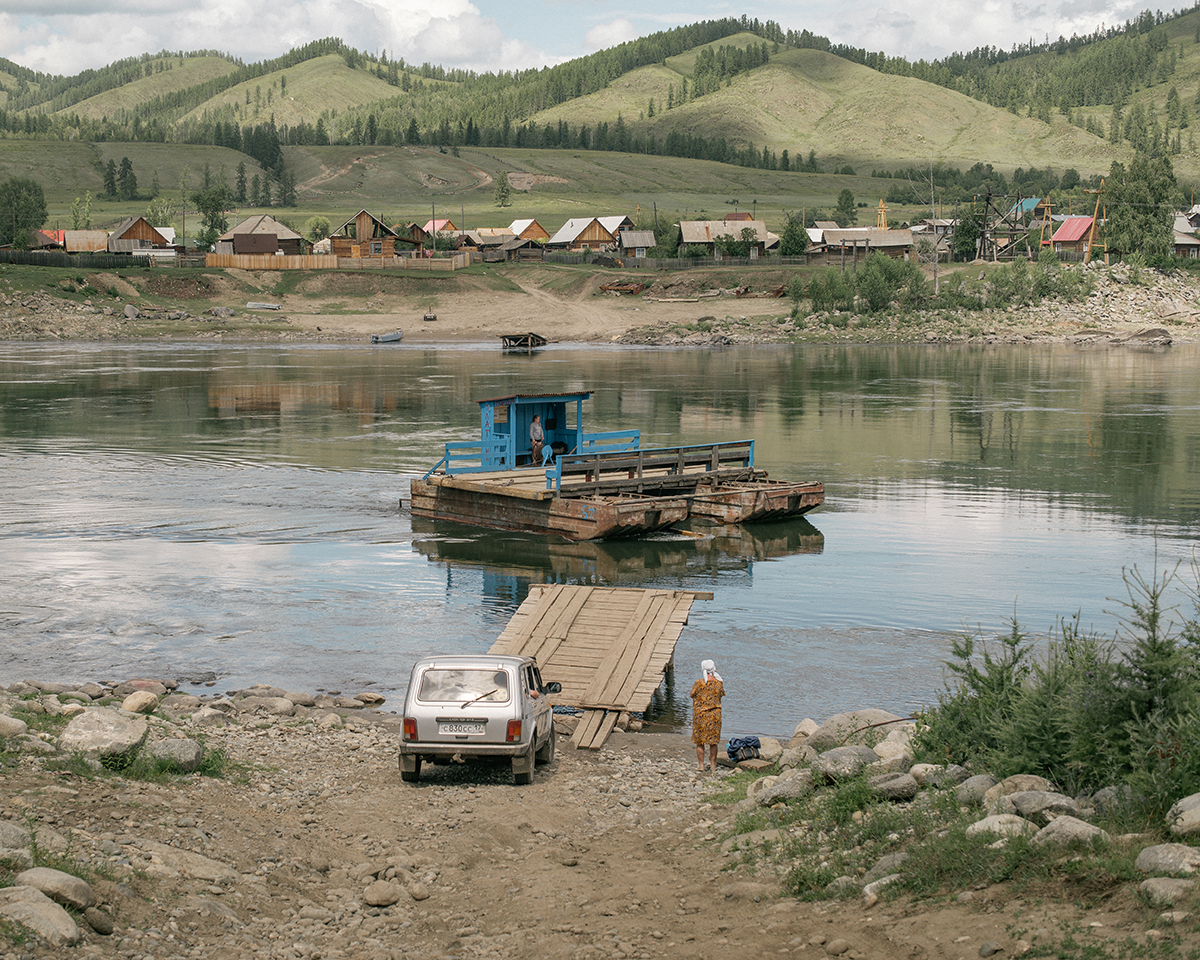 Photograph of a basic river ferry crossing in a remote village