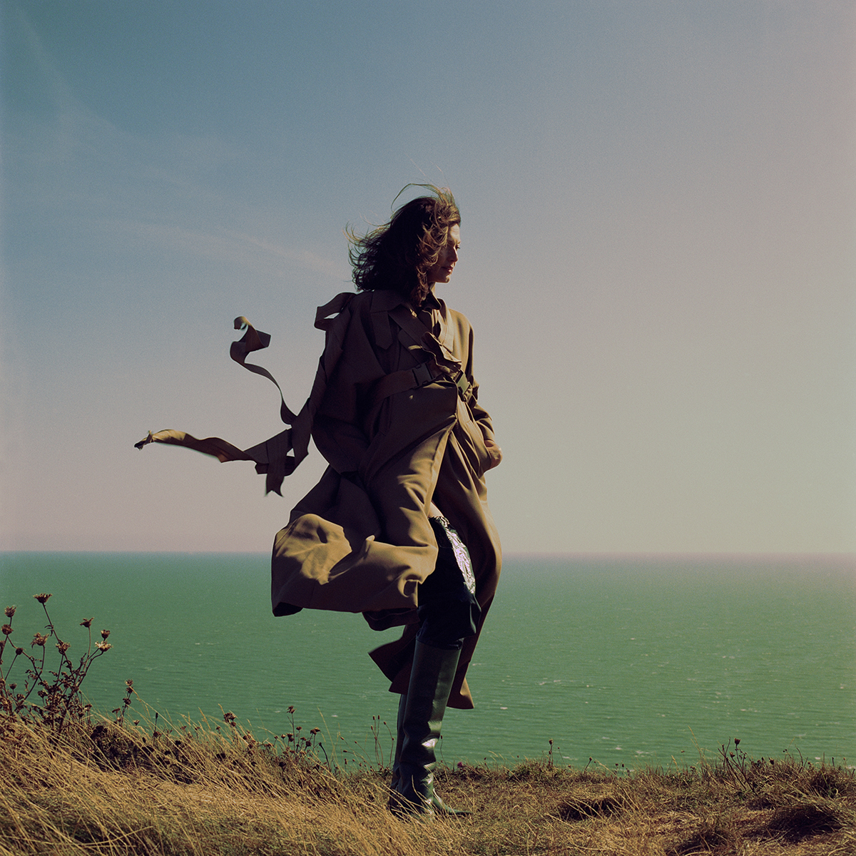 Model pictured standing on cliff edge