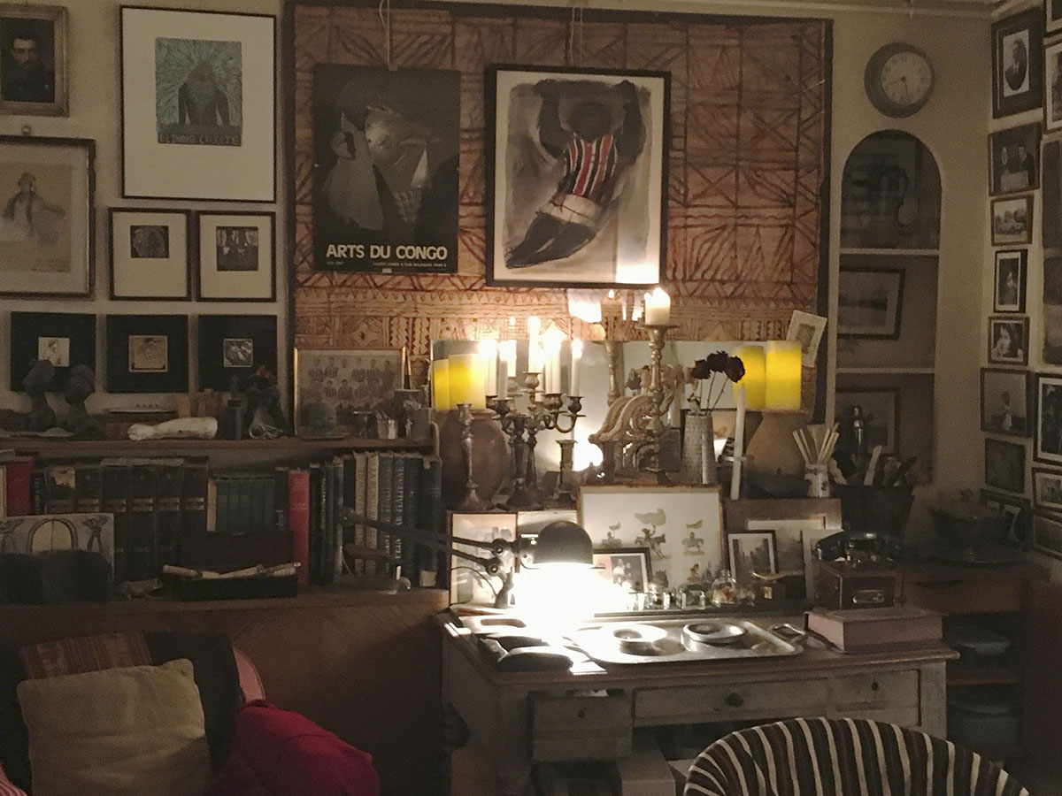Artist studio filled with artefacts and paintings