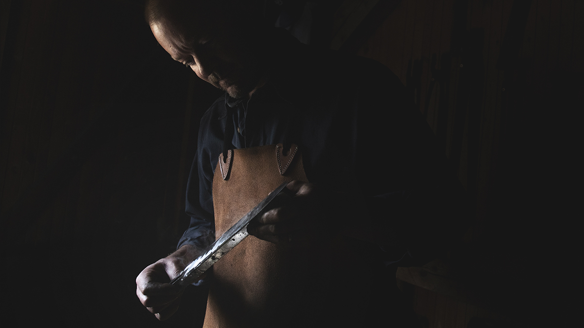 Knife maker welding a knife
