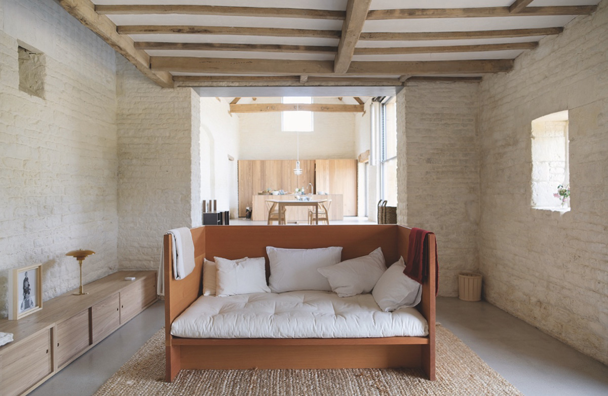 Open kitchen living space with exposed beams