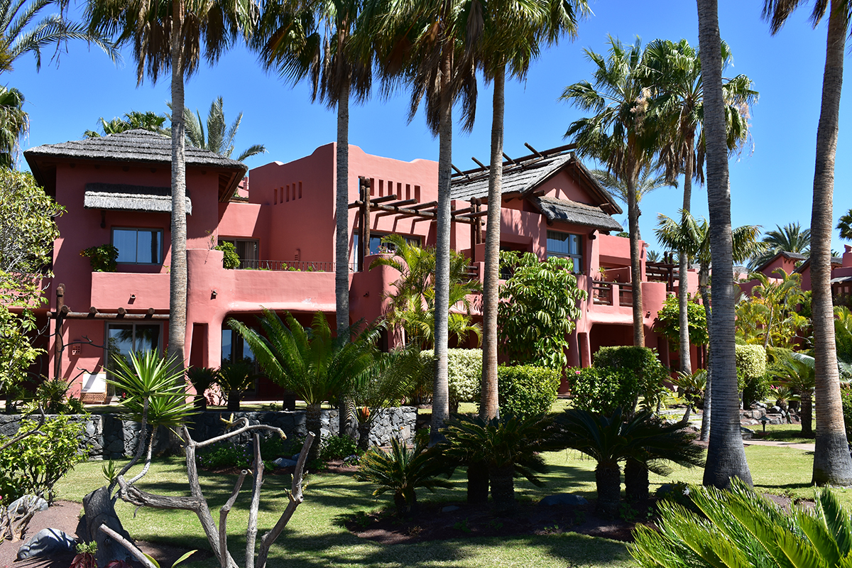 Luxurious pink villa in tropical garden