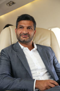 Man sitting inside private jet