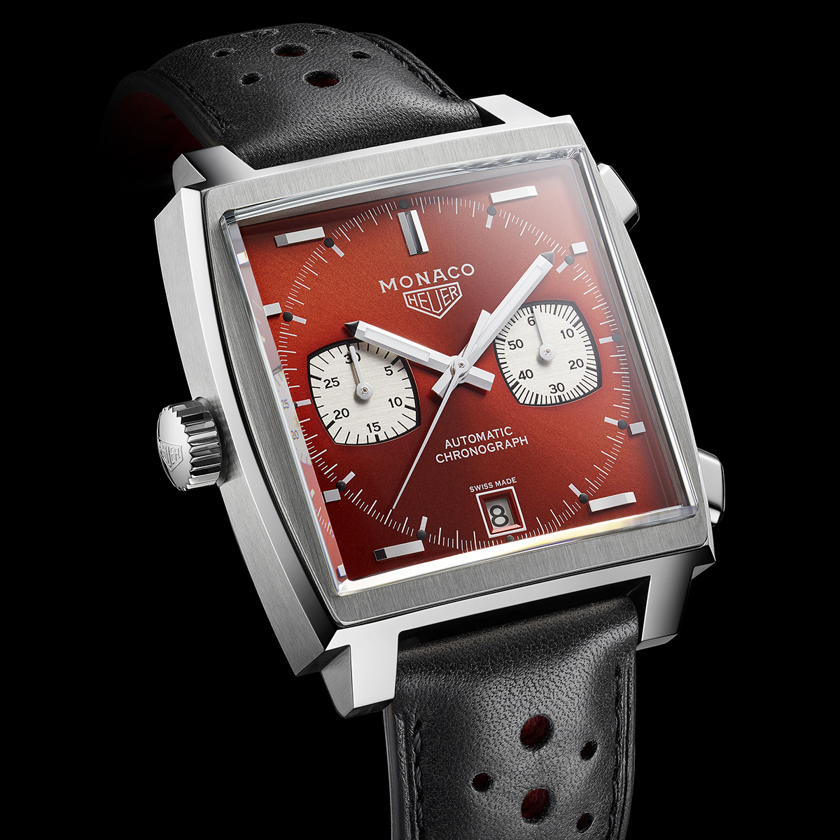 Luxurious watch with red face and black strap