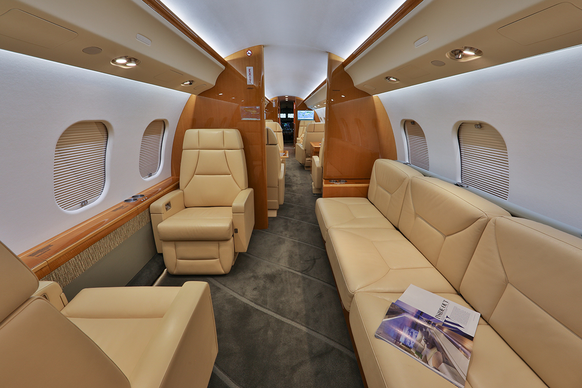 Private jet interiors with beige leather seats