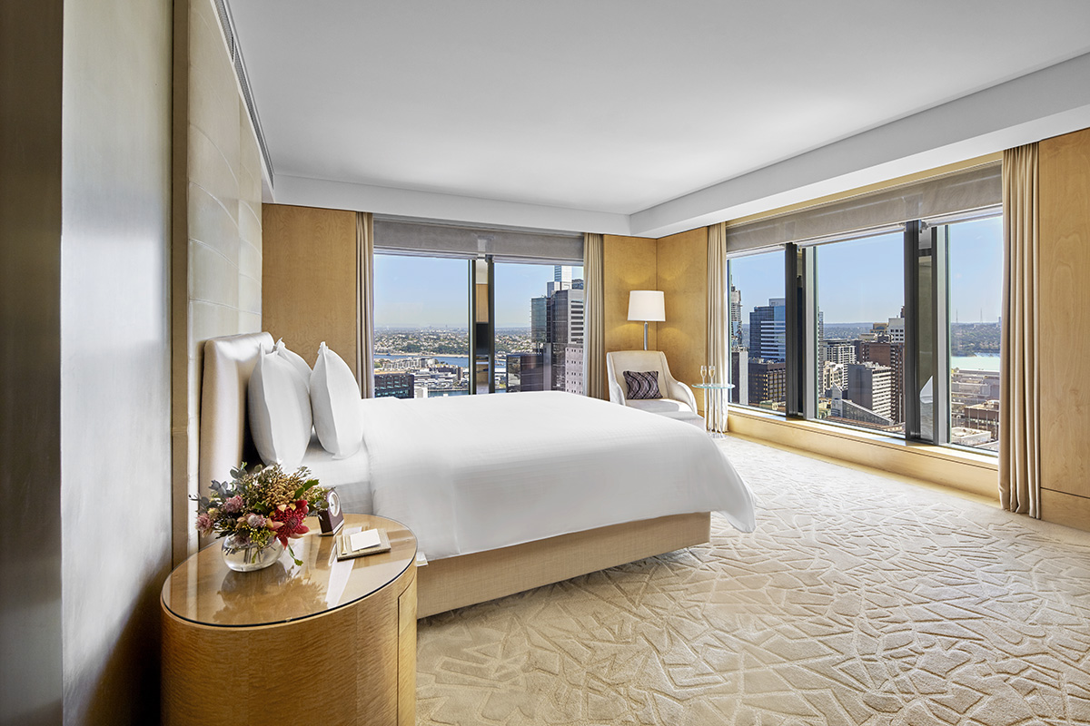 Luxurious hotel bedroom with city views