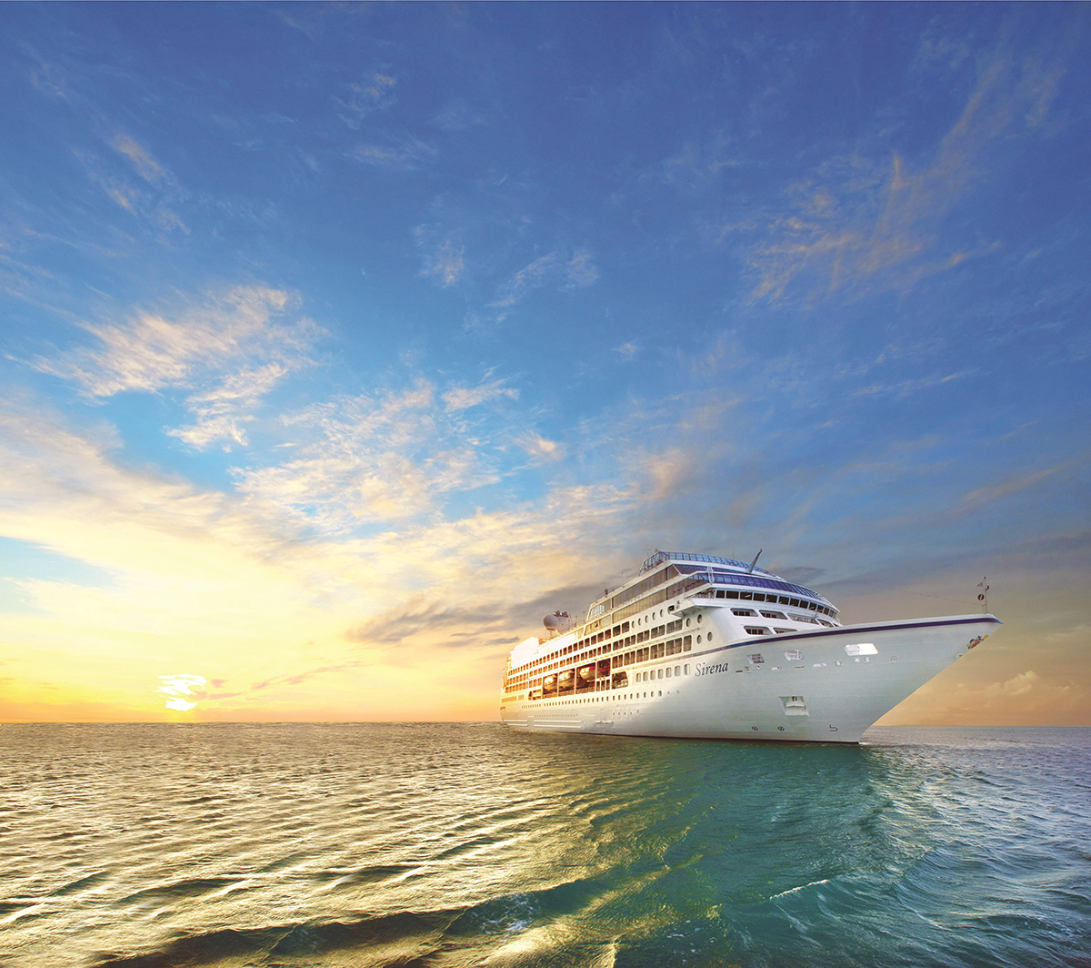 Luxurious cruise ship pictured floating at sunset