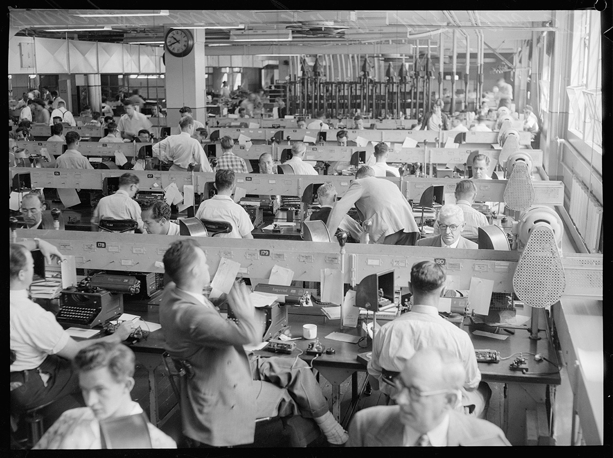 Vintage photographs of workers inside post office