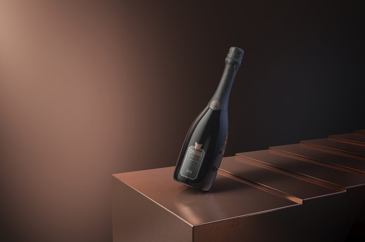 Prosecco bottle against brown background