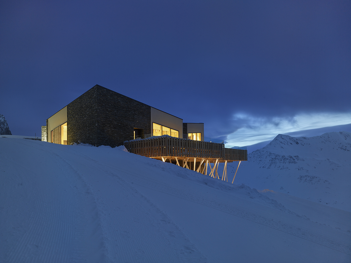 Contemporary building sitting on ski slope