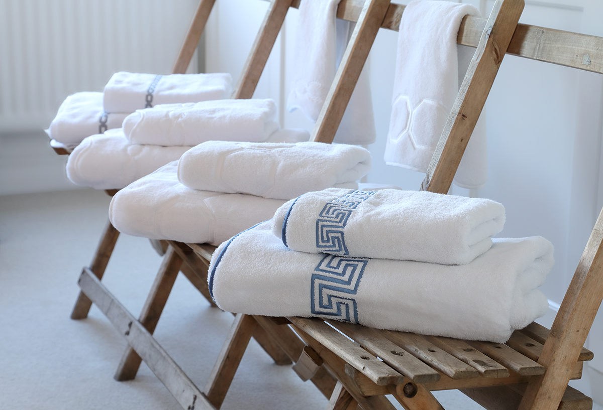 Luxurious towels shown on chairs