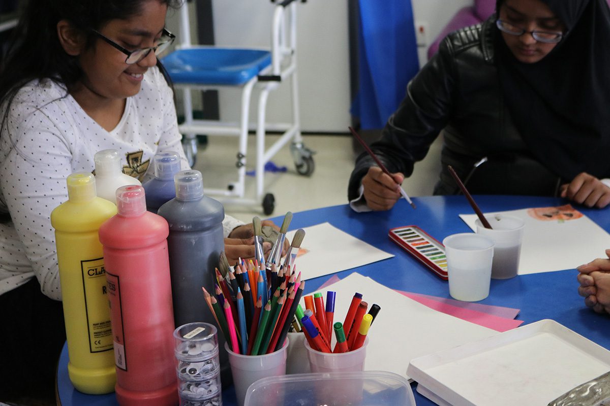 Children painting and drawing