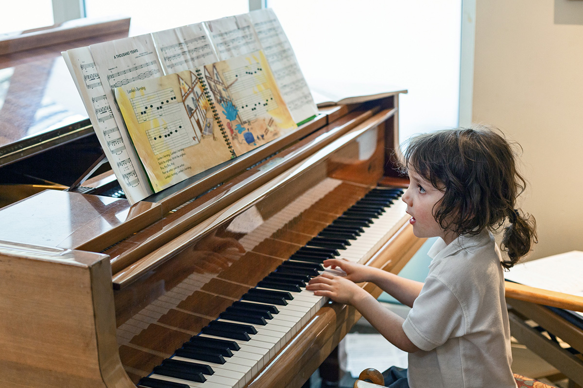 Child playing the piano