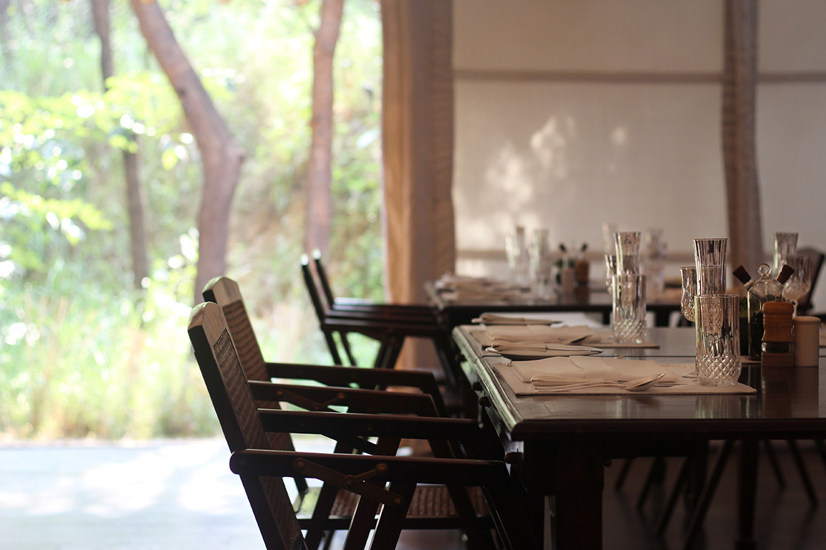 Dining tables inside luxury tent