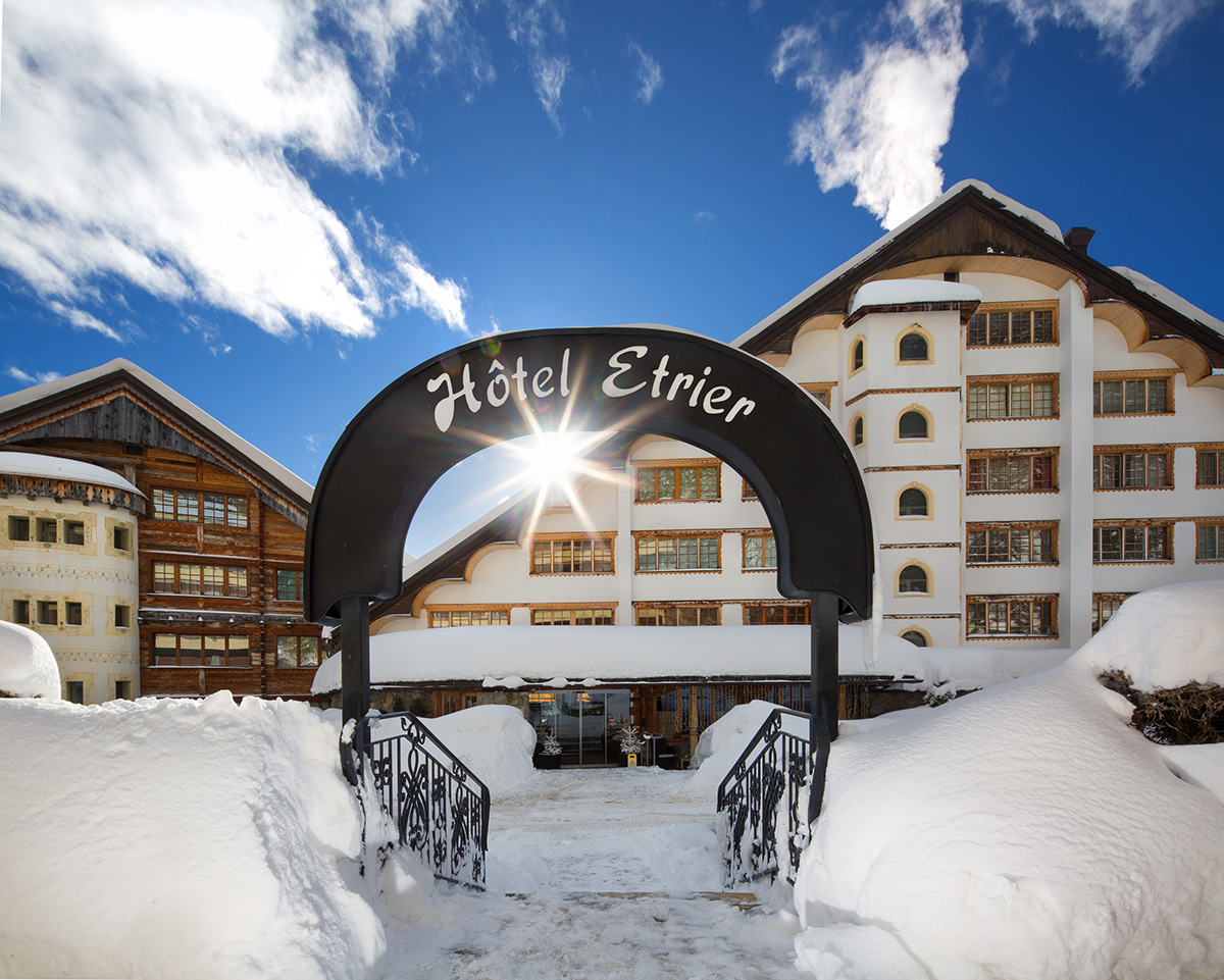 Exterior of an alpine hotel in winter