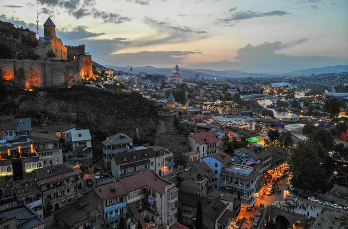 Mountainside city at night