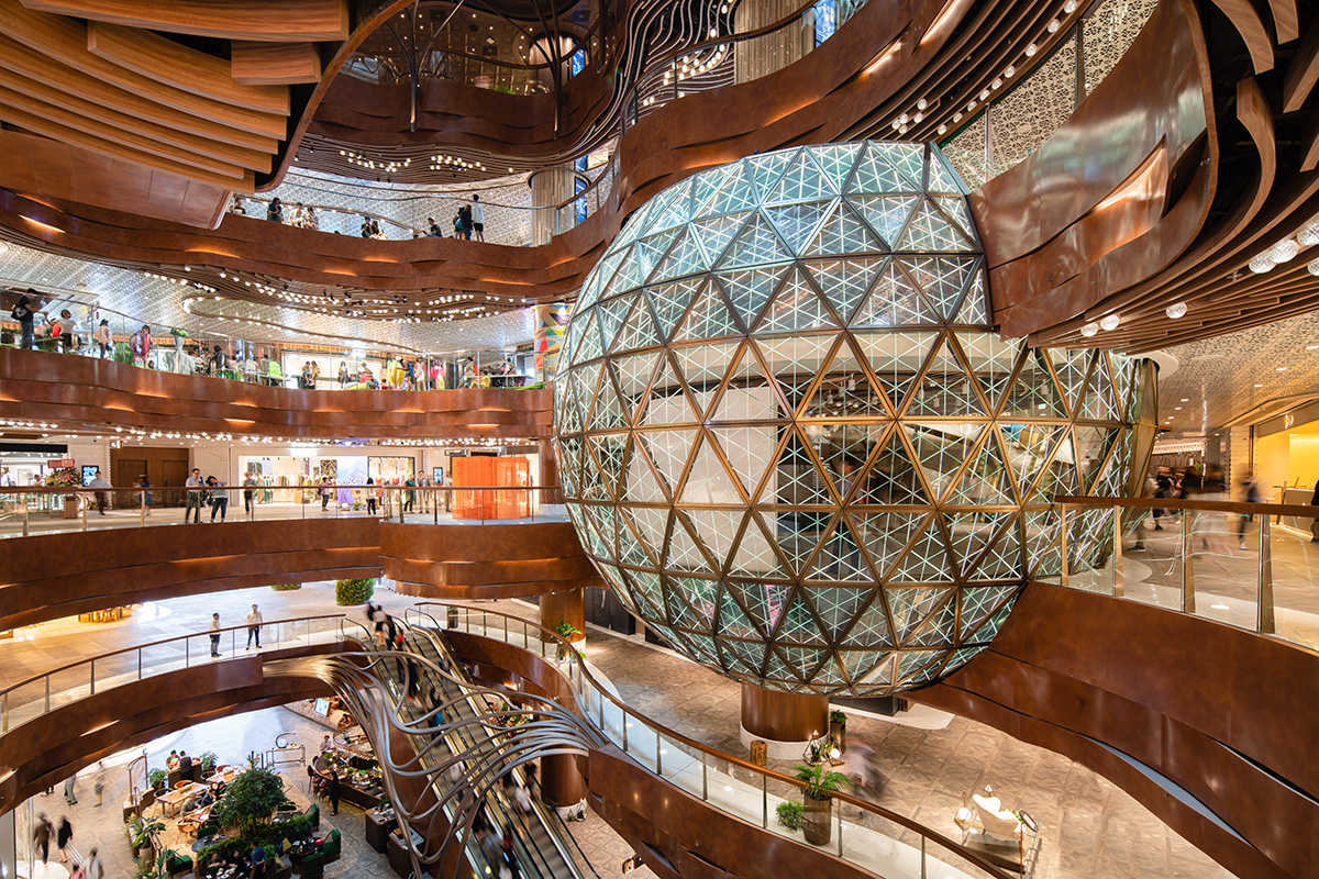 Inside a futuristic mall setting