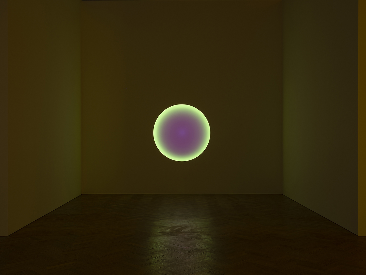 glowing light on wall in gallery