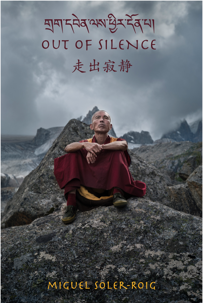 Monk sitting on a rock