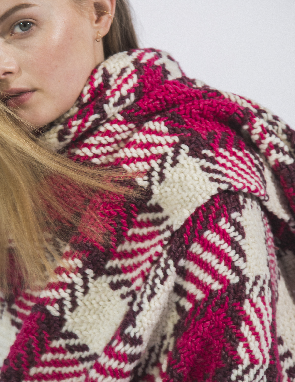 woman in pink scarf