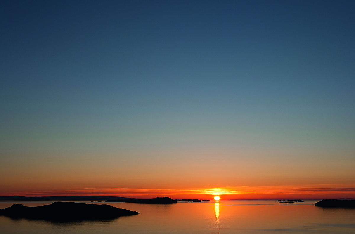 sunsetting over the ocean