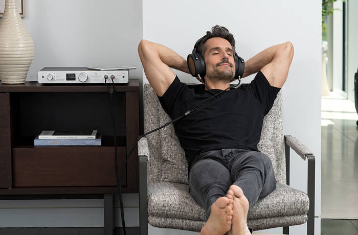 man listening to music with headphones