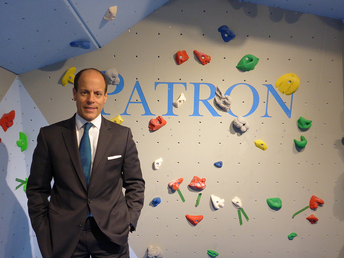 man with climbing wall