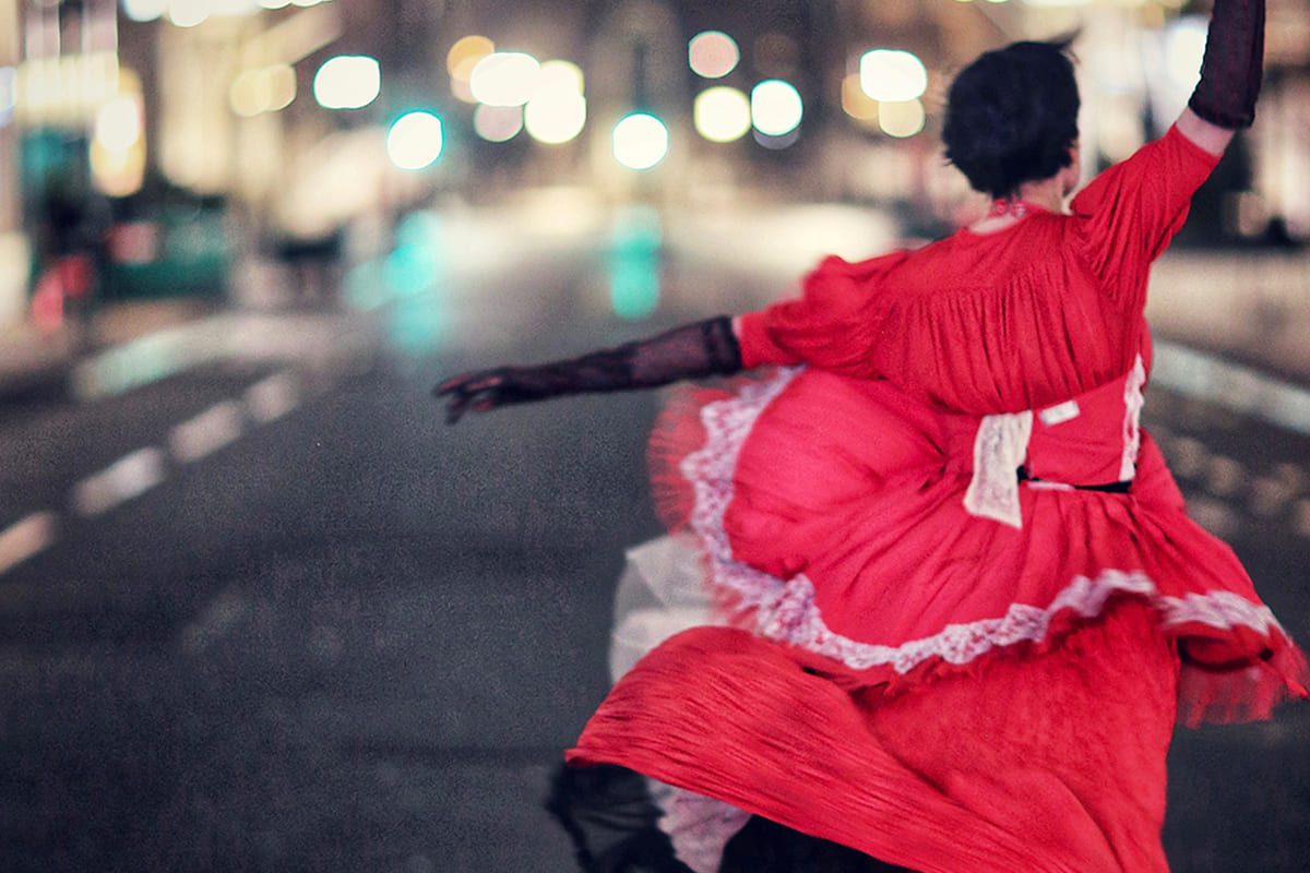 A prima ballerina dances in the London lockdown moonlight