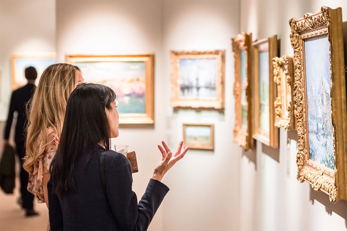 women looking at art