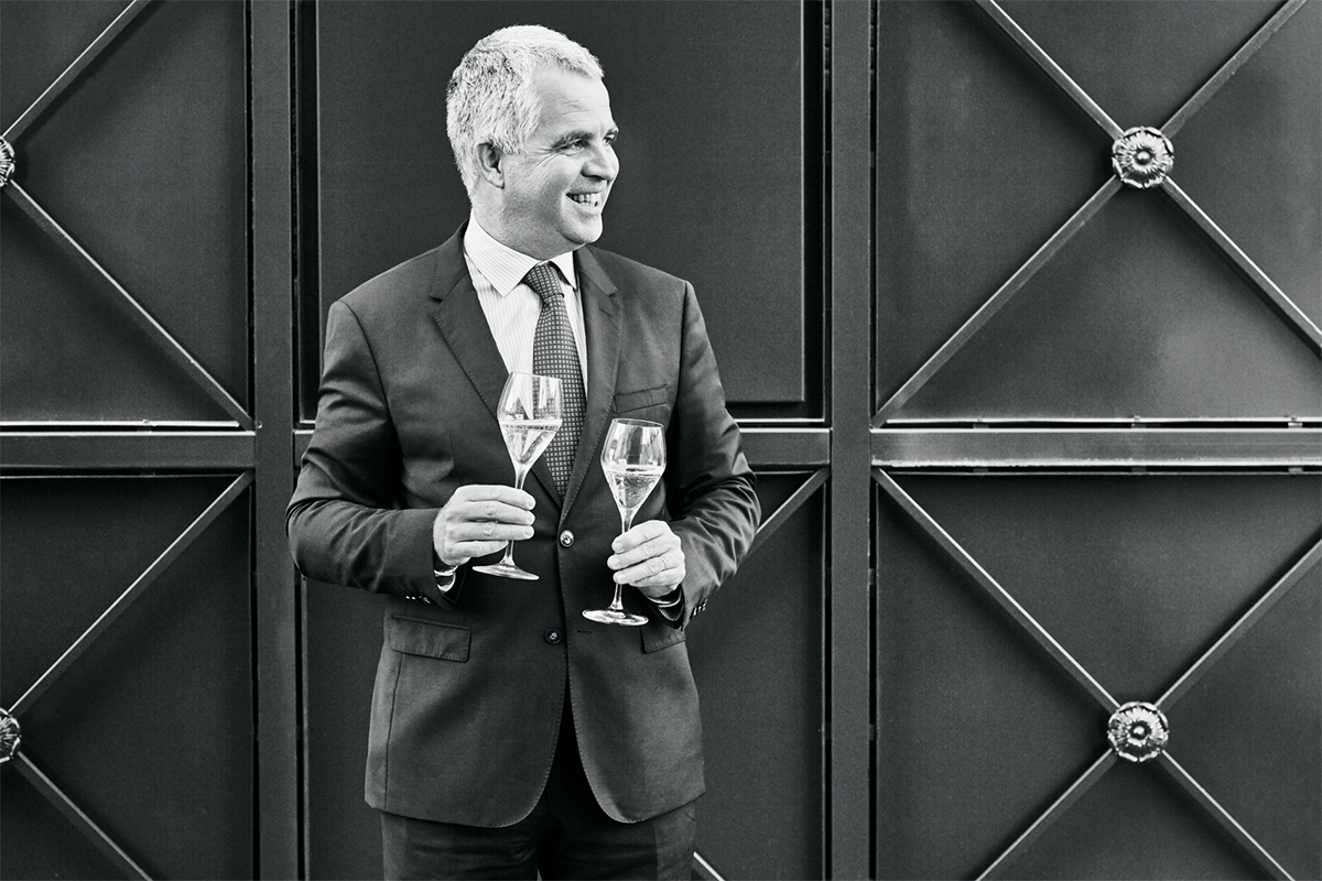 Man holding two glasses of champagne