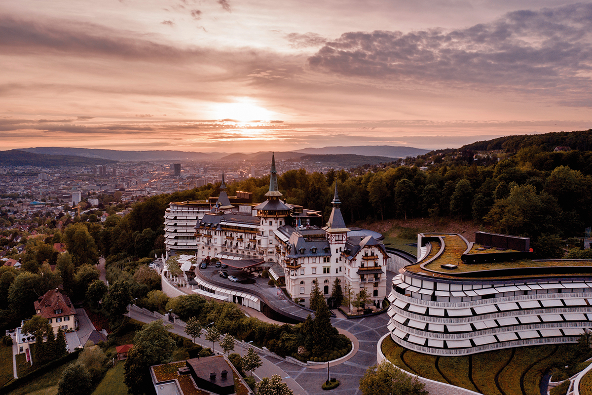 mountaintop hotel overlooking a city