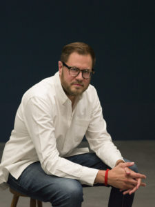 portrait of man in white shirt