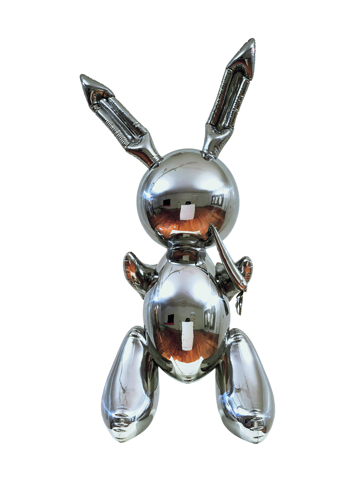 silver sculpture of a rabbit