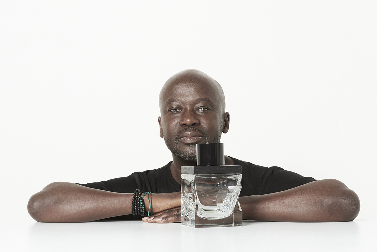 man with glass decanter