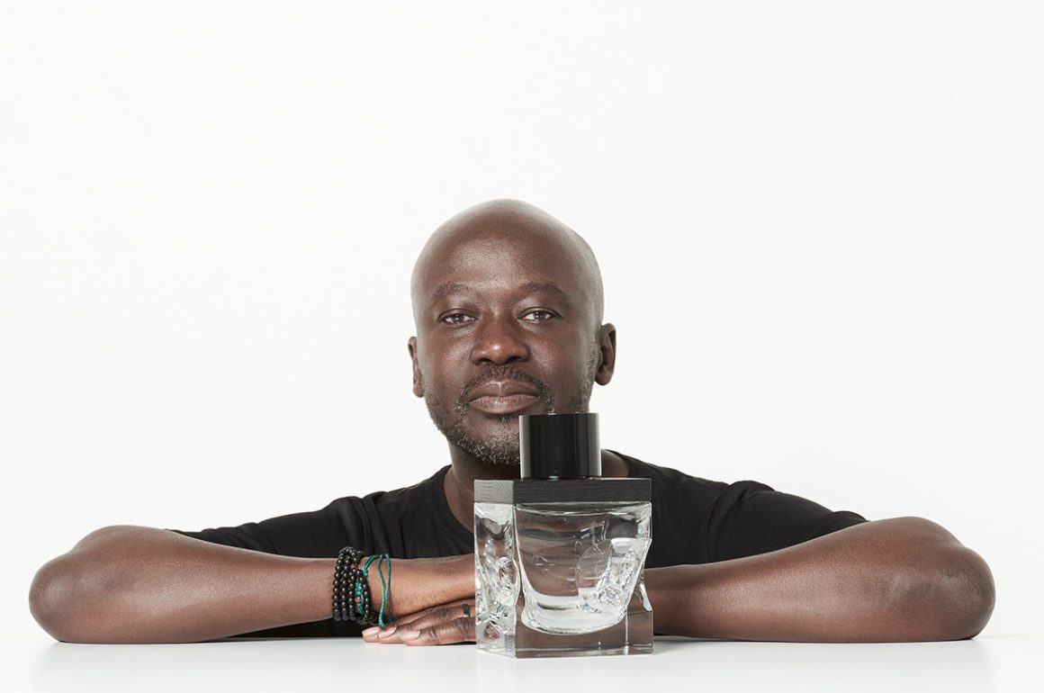 man with glass decanter