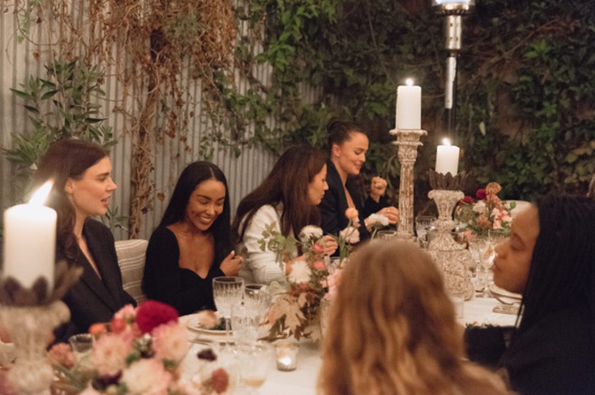 people gathered round dining table