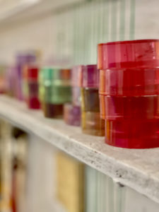 coloured glass on shelves