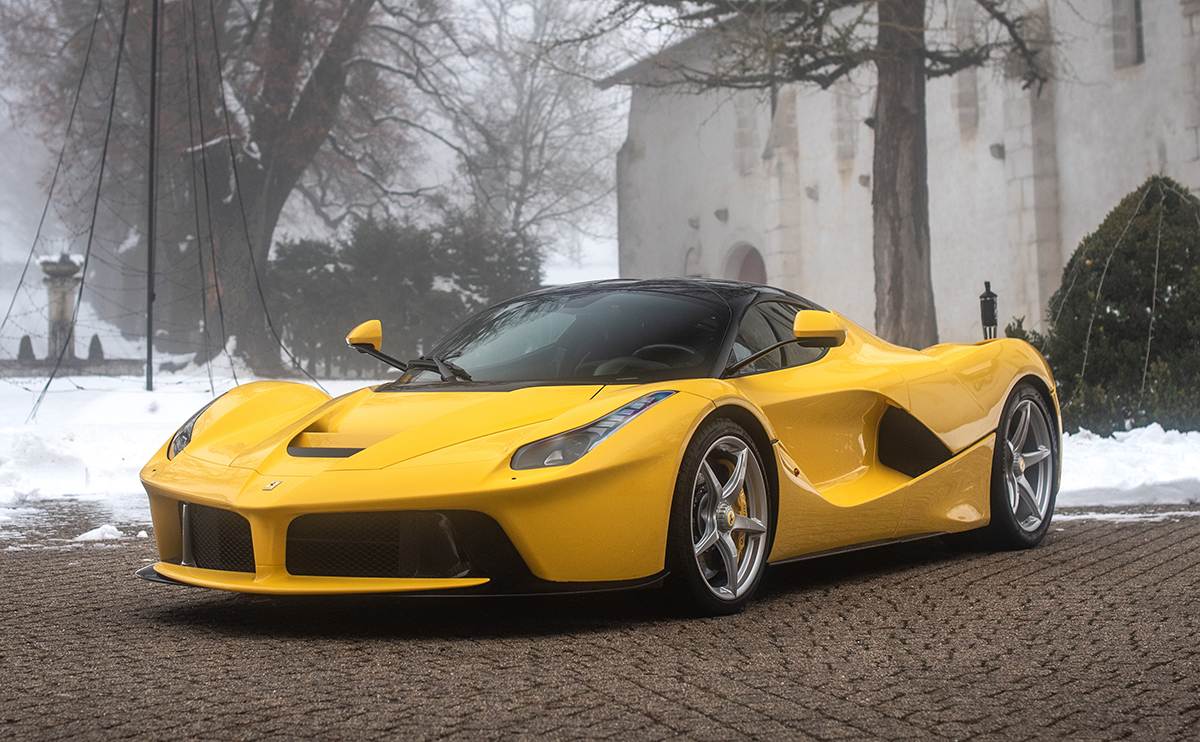 A yellow ferrari in the snow