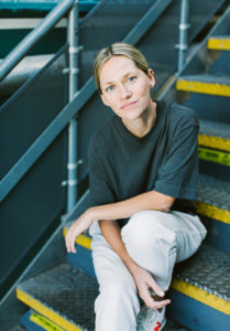 woman sitting on stairs