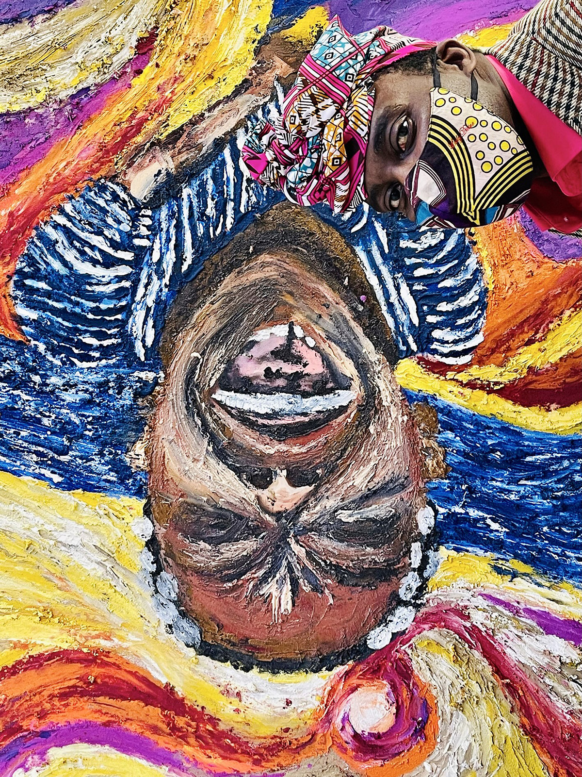 A painting of an African man laughing