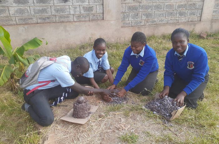 school children playing on the ground