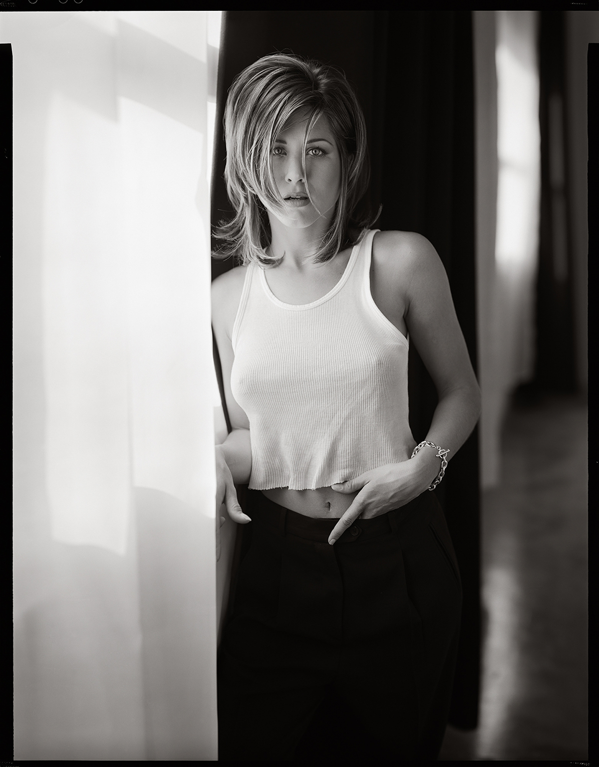 Jennifer Aniston in a white vest